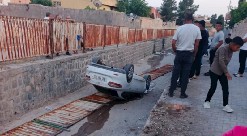 Çocukların el frenini indirdiği otomobil tahliye kanalına uçtu
