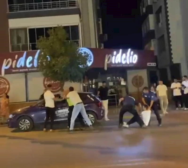 İzmir’de polise saldırı anı kamerada
